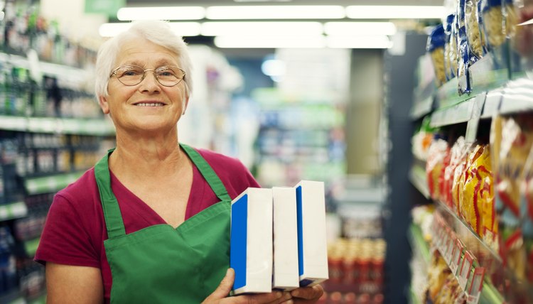 Senior woman working at supermarket
