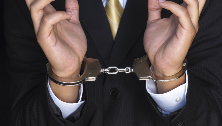 Handcuffed hands of businessman