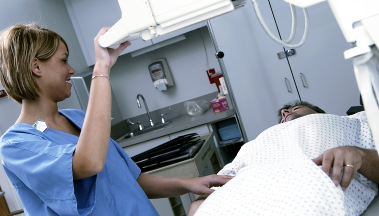 Lab technician taking X-rays