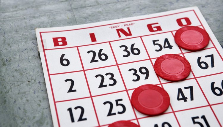 Red bingo card with winning chips.