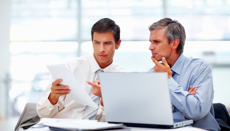 Business colleagues discussing on a project