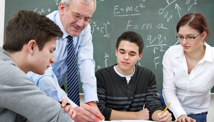 teacher with the high school students