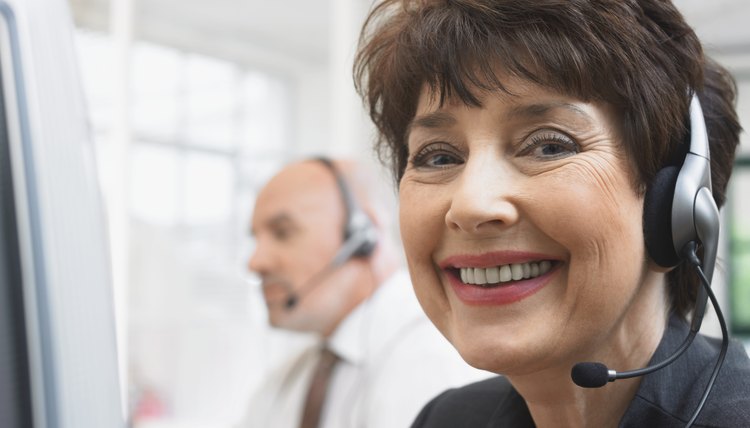 Portrait of a Smiling Businesswoman Wearing a Headset