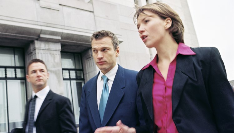 Businesspeople walking outdoor