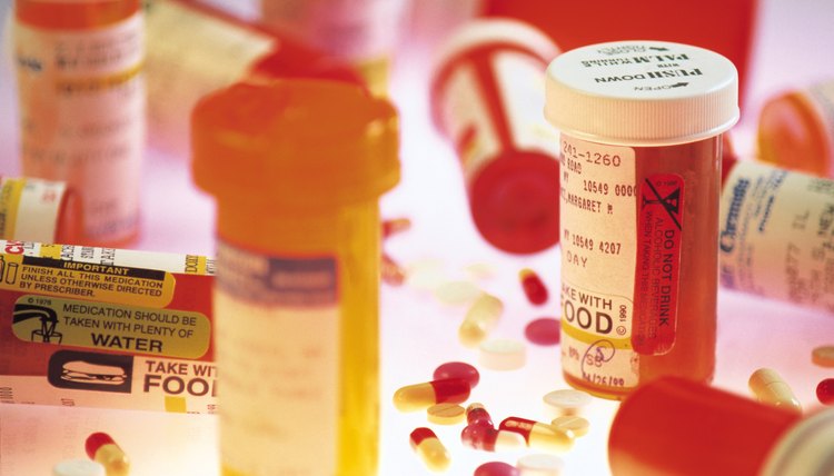 Various prescription bottles and pills