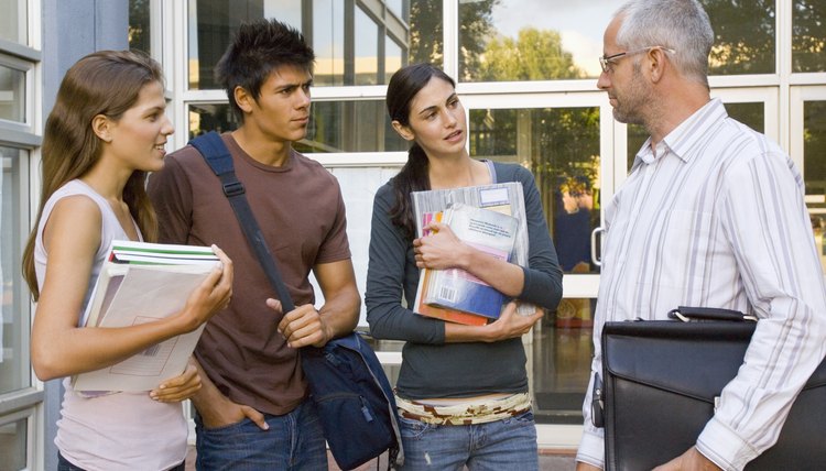 Students talking with teacher