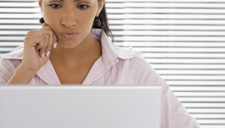 Businesswoman using laptop