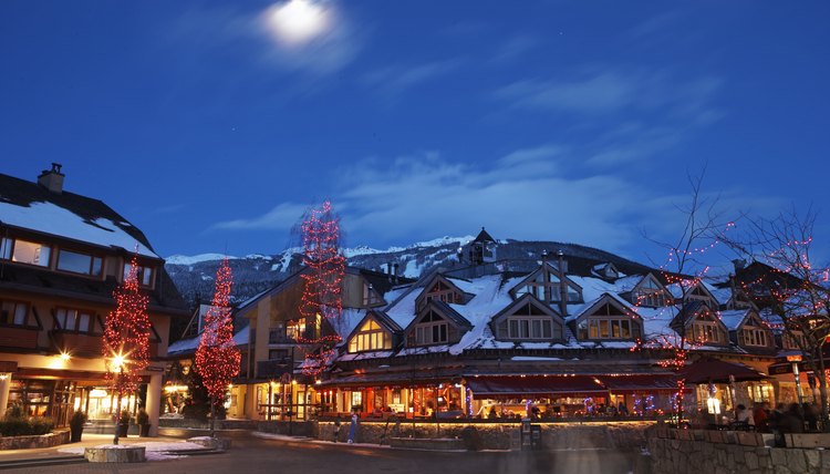 Canada, British Columbia, moon over Whistler Village at dusk