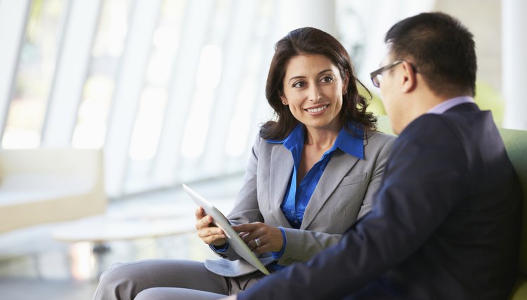 business woman explaining retirement plan to employee