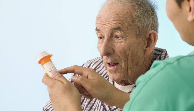 nurse explaining medication to patient