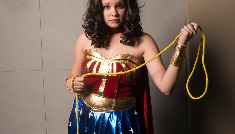 Young girl dressed up as Wonder Woman