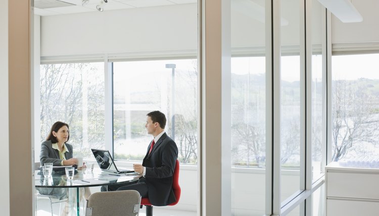 Businesspeople working in office