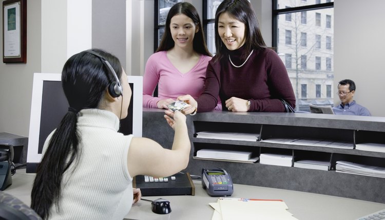 Teenage Girls at Counter at Medical Clinic