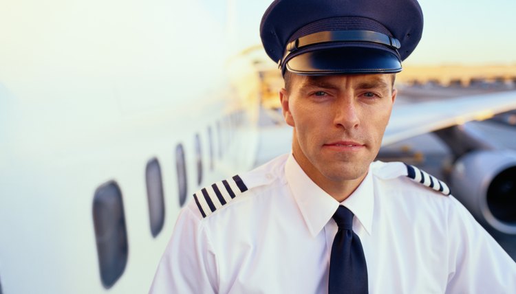 Portrait of Pilot in Front of Cargo Plane