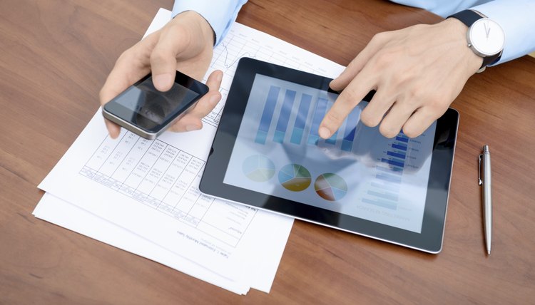 Man working with modern devices