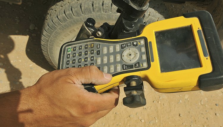 U.S. Air Force technician using a global positioning system device.