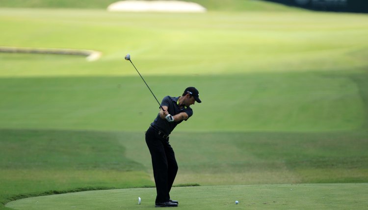 Unlike McIlroy, Schwartzel's right elbow bends early and his wrists set by the time his left arm is parallel to the ground.