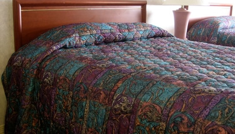 Housekeeping courses teach students how to make beds.
