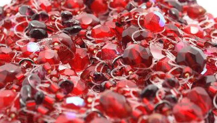 Scarlet beads image by Olga Khopshanosova from Fotolia.com