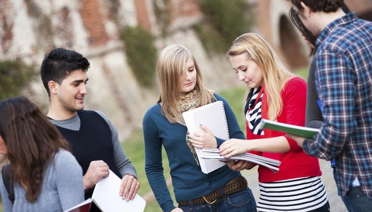 Students talking together on campus.
