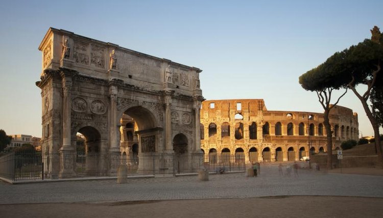 The Arch of Constantine and the Colosseum in ancient Rome.
