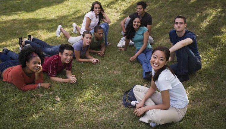 A group of teenagers visiting a college campus.