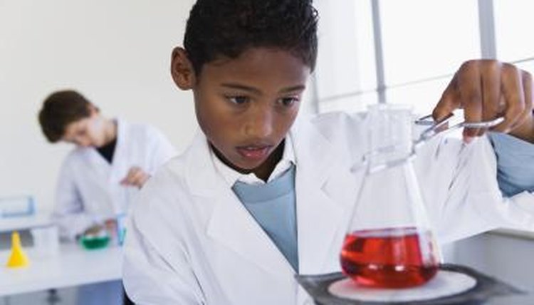 Student performing an experiment