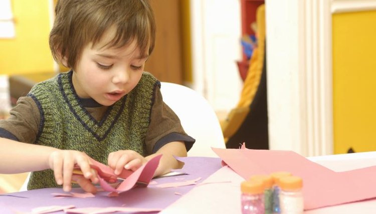Boy playing with crafts