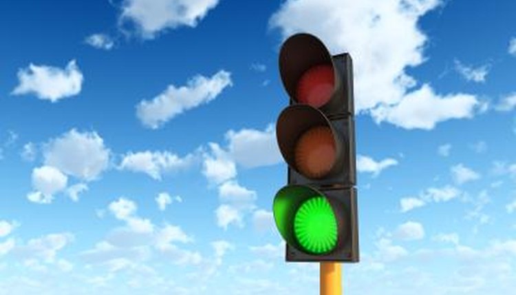 Play a game to teach children what the different colored lights mean.