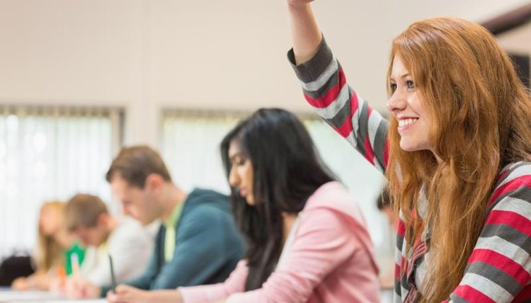 College students sitting in a lecture.