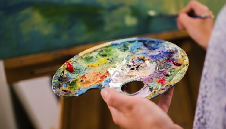 Artist holding palette