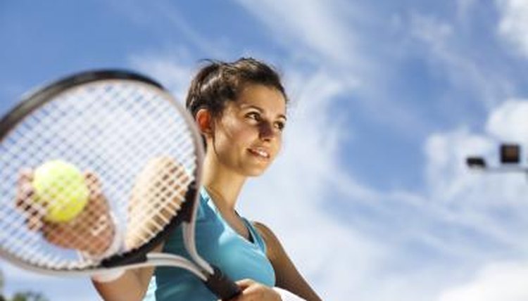 A woman is playing tennis.