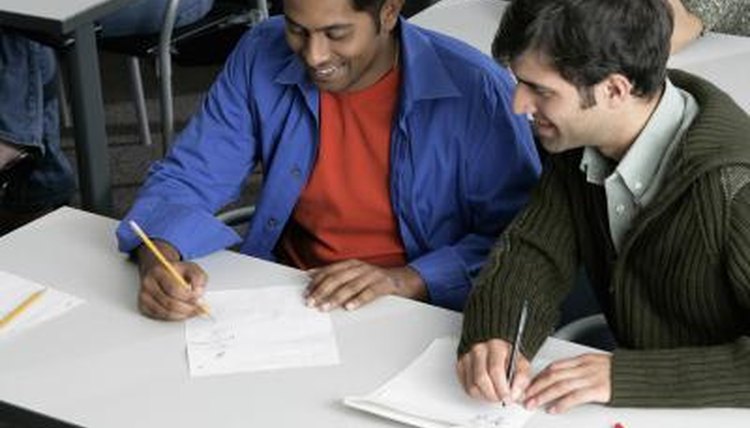 College students comparing notes.
