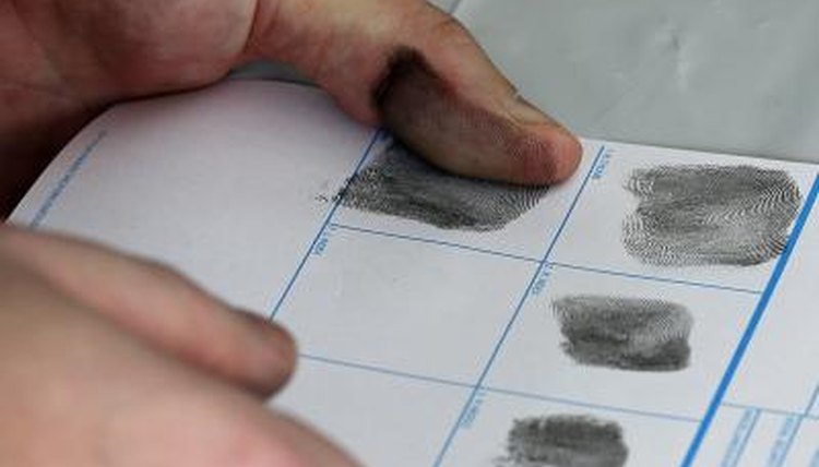 Concealed gun permit user being fingerprinted