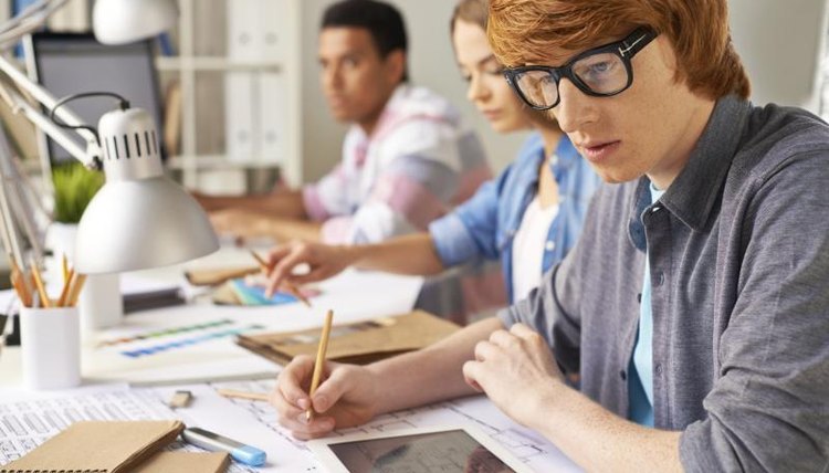 Architecture students at work in a classroom