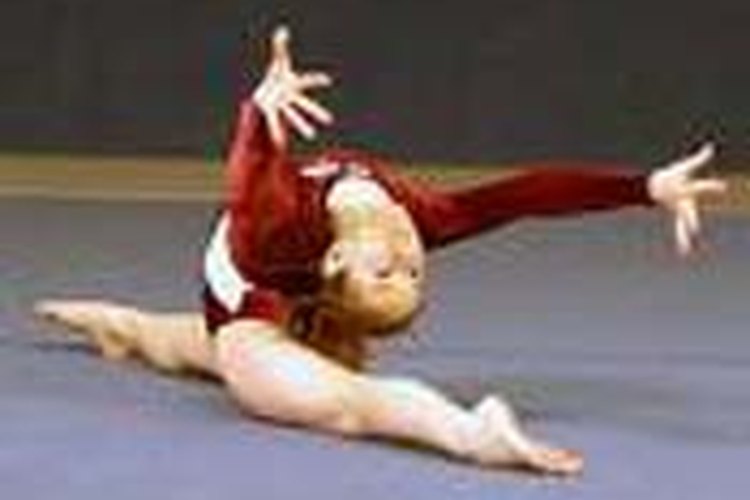 Una gimnasta haciendo una apertura frontal.