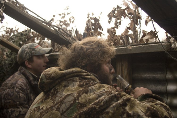 duck hunters image by cherie from Fotolia.com A hunter's safety course from Bass Pro Shops will help you obtain a needed hunting permit.