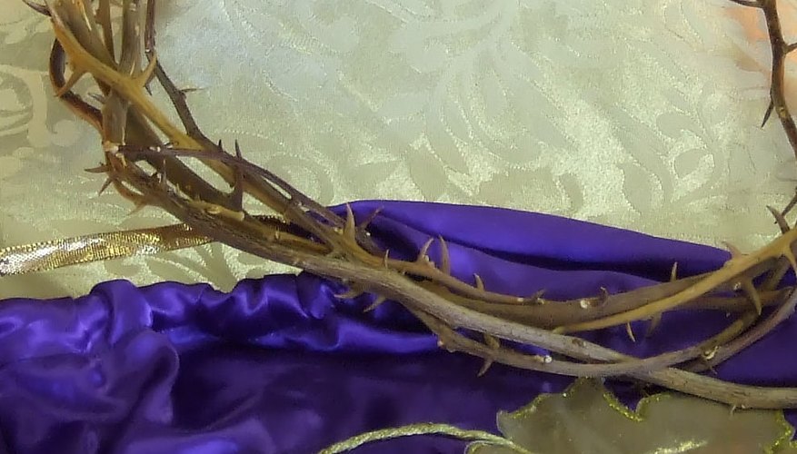 A crown of thorns represents the crucifixion, as part of an Easter decorative display. A crown of thorns represents the crucifixion, as part of an Easter decorative display.