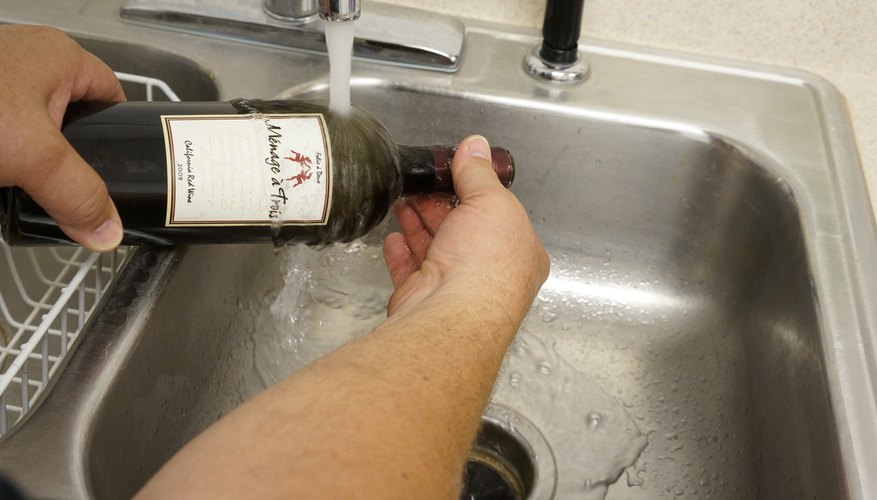 Photo Credit: Jeff Farris Cooling the scored bottle.