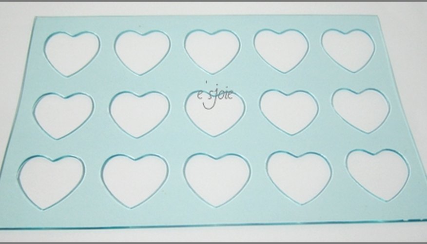 You can use stencils to create exciting shapes with your pictures, or cut them freehand.