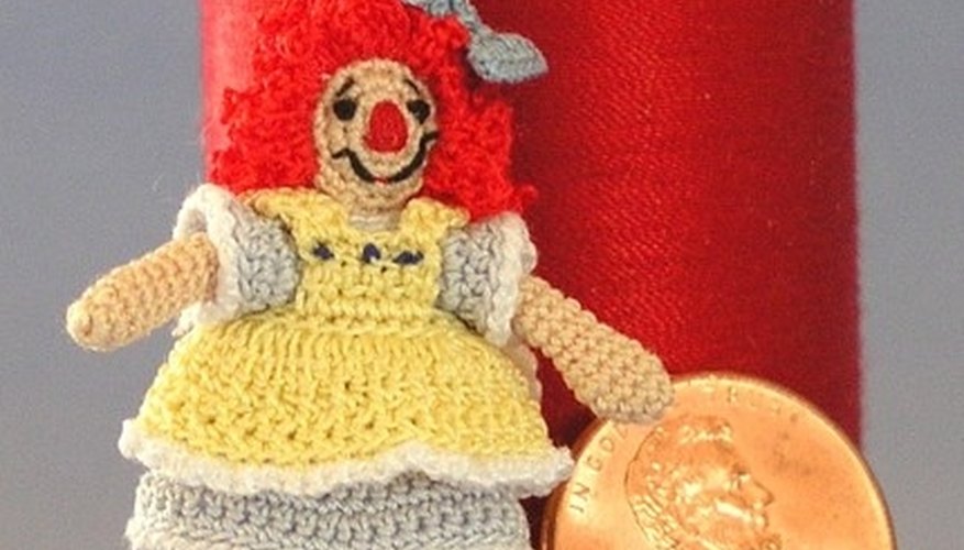 Crocheted doll with crocheted hair. Crocheted doll with crocheted hair.