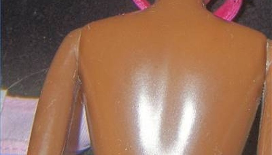 This dark-skinned Barbie has a 1966 date marking her back while her head has 1967 imprinted. The country of manufacture is China.