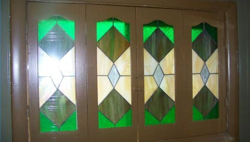 Stained glass window shutters created by Bob Dodrill Sr.
