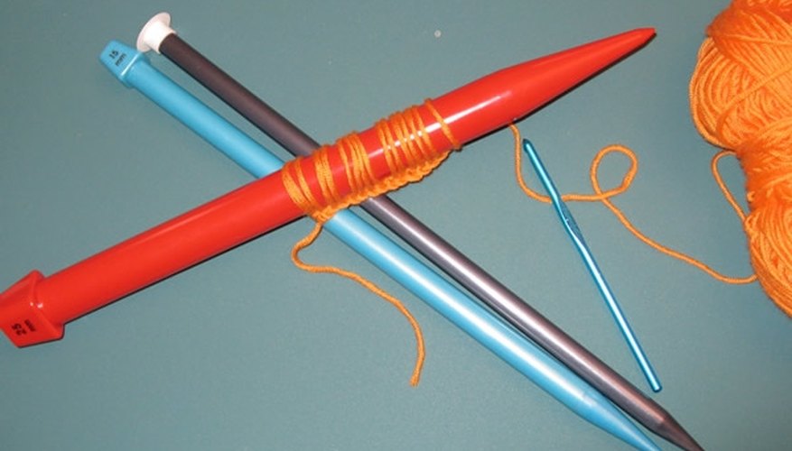 Loops are pulled up through a base chain and placed on the large needle.