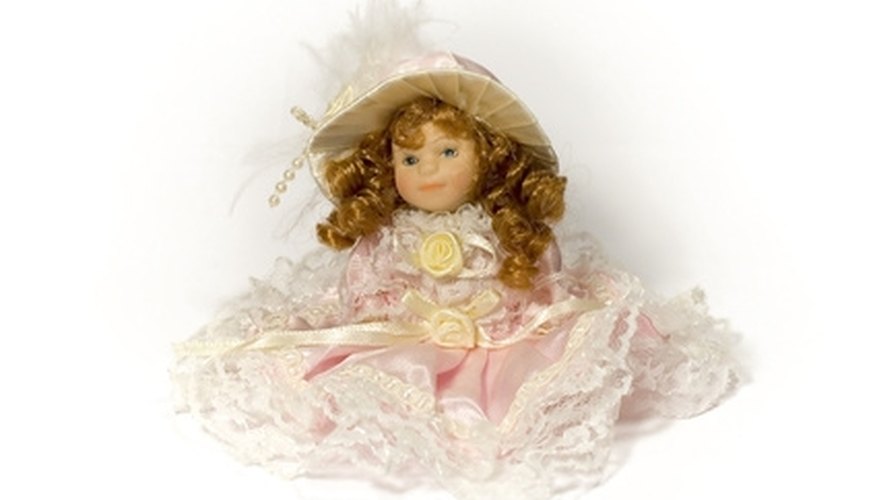 Many antique German bisque dolls are dressed in feathers, silk and other fancy ornamentation. Many antique German bisque dolls are dressed in feathers, silk and other fancy ornamentation.