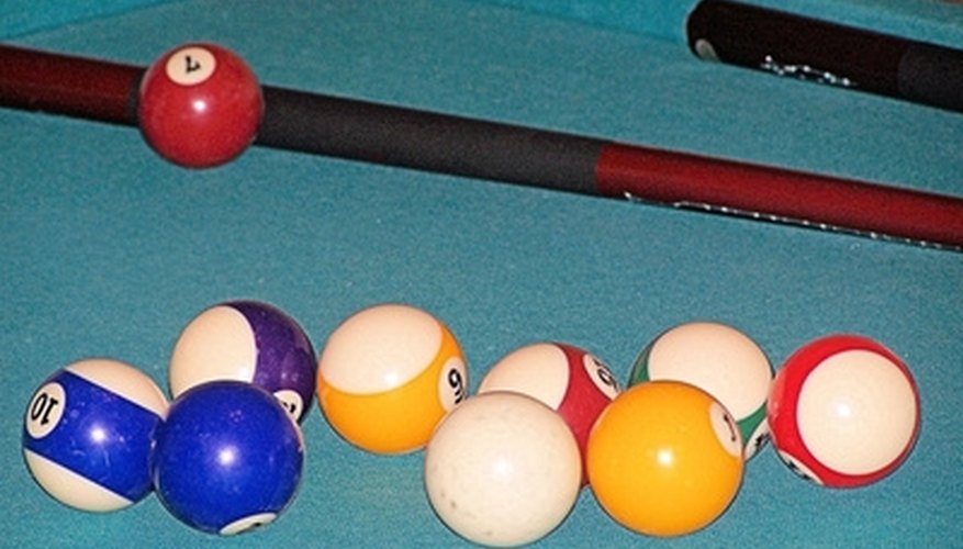 Replace the bumpers along the rail of your pool table. Replace the bumpers along the rail of your pool table.