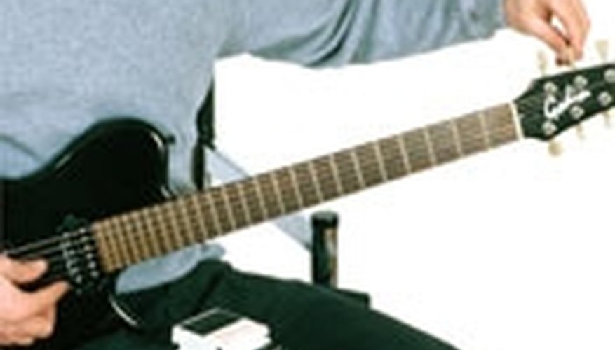 Tune a Guitar With a Tuner Tune a Guitar With a Tuner