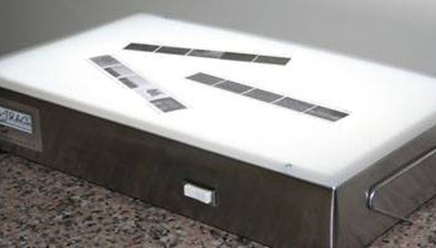 A light box with strips of film on top