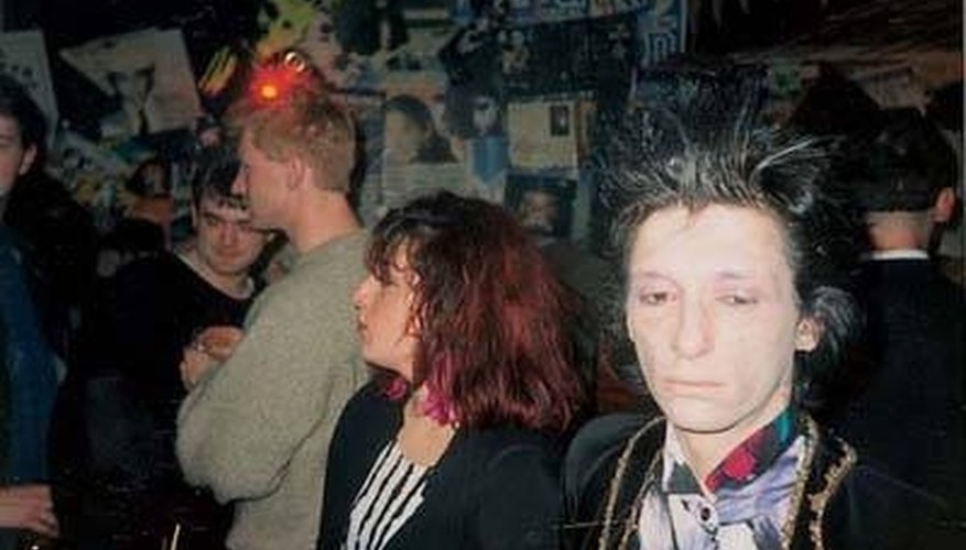 Johnny Thunders, right, seen later in life with his fans. Johnny Thunders, right, seen later in life with his fans.