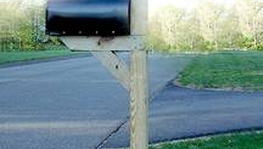 Concrete adds stability to your mailbox post. Concrete adds stability to your mailbox post.